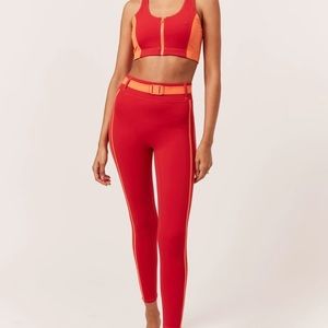 Bandier&Solid&Striped workout bra and leggings matching set.